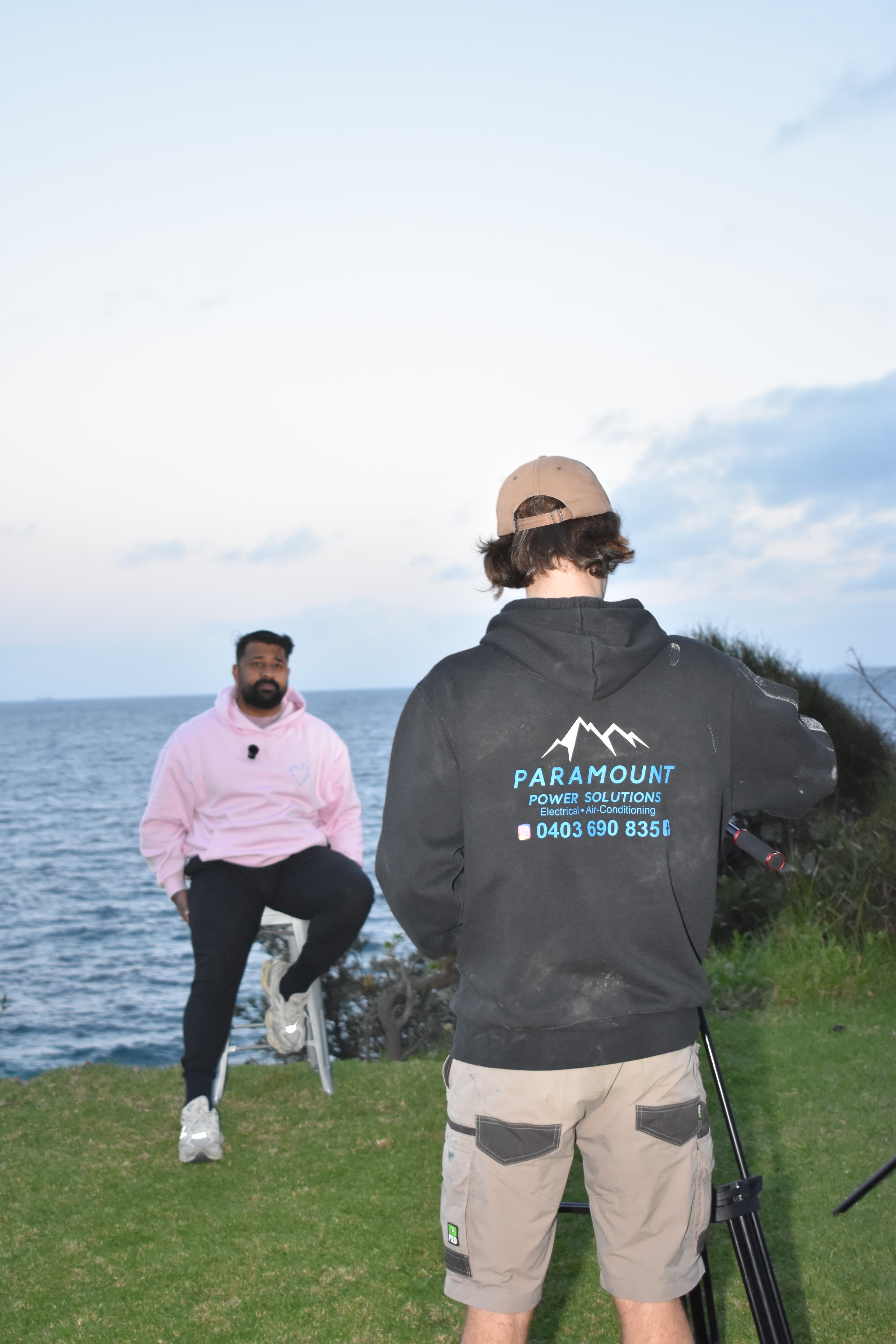 Denim Budai walking through a shoot with a client